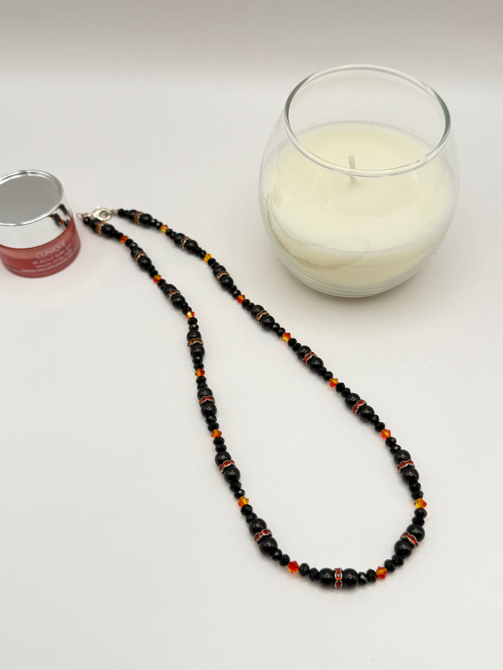 Orange Swarovski crystal with black onyx pearls