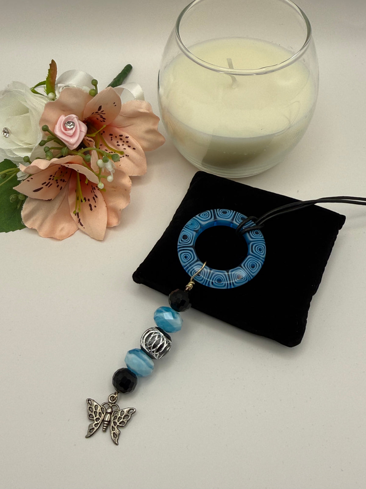 Blue Beaded Circle Pendant Necklace with Butterfly Charm