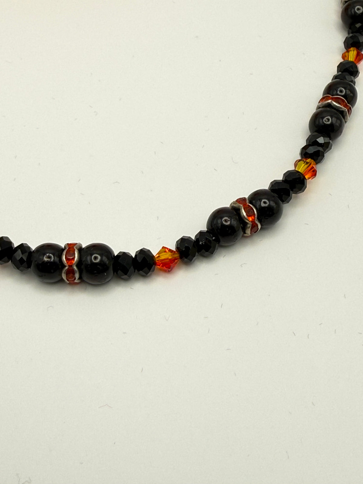 Orange Swarovski crystal with black onyx pearls