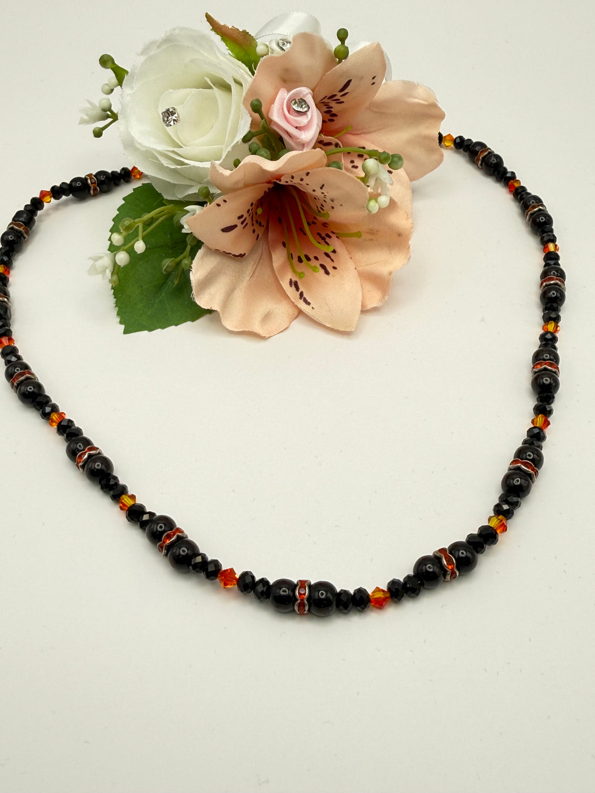 Orange Swarovski crystal with black onyx pearls