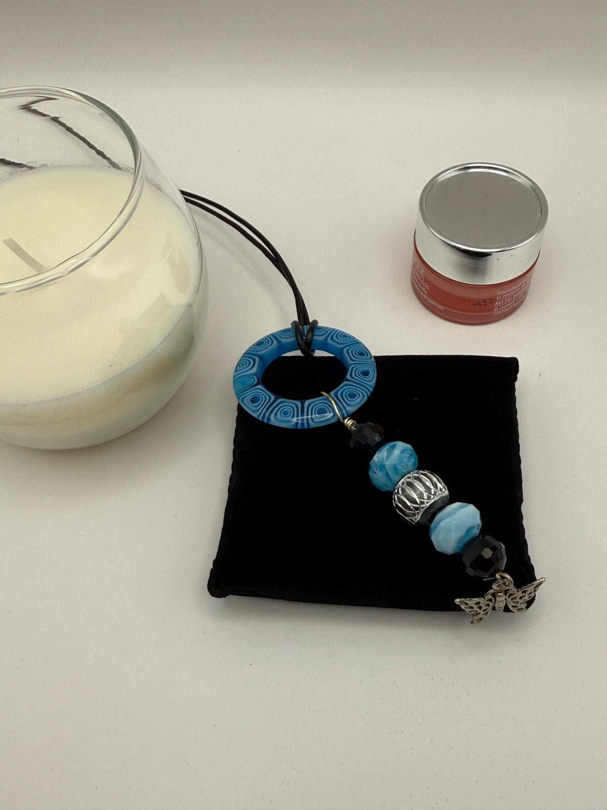 Blue Beaded Circle Pendant Necklace with Butterfly Charm