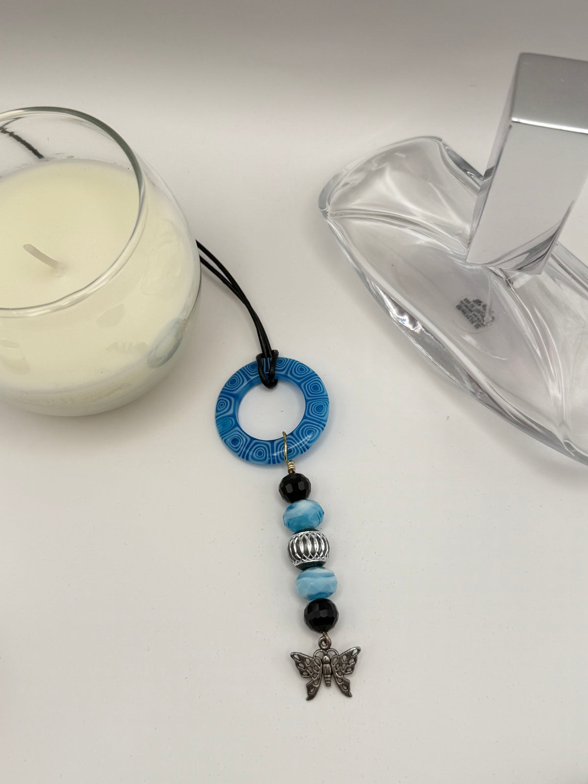 Blue Beaded Circle Pendant Necklace with Butterfly Charm