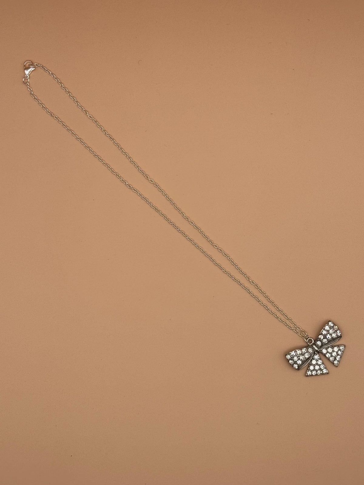 Silver Diamonte Bow Pendant Necklace