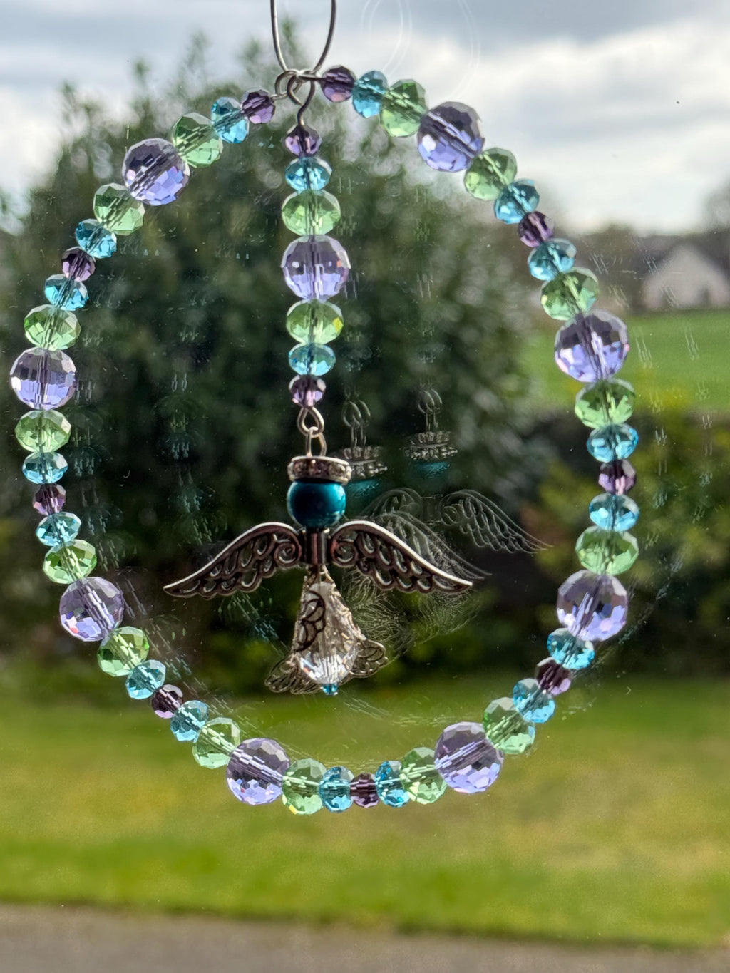 Angel Suncatcher â€“ Beaded Circle Window Hanging