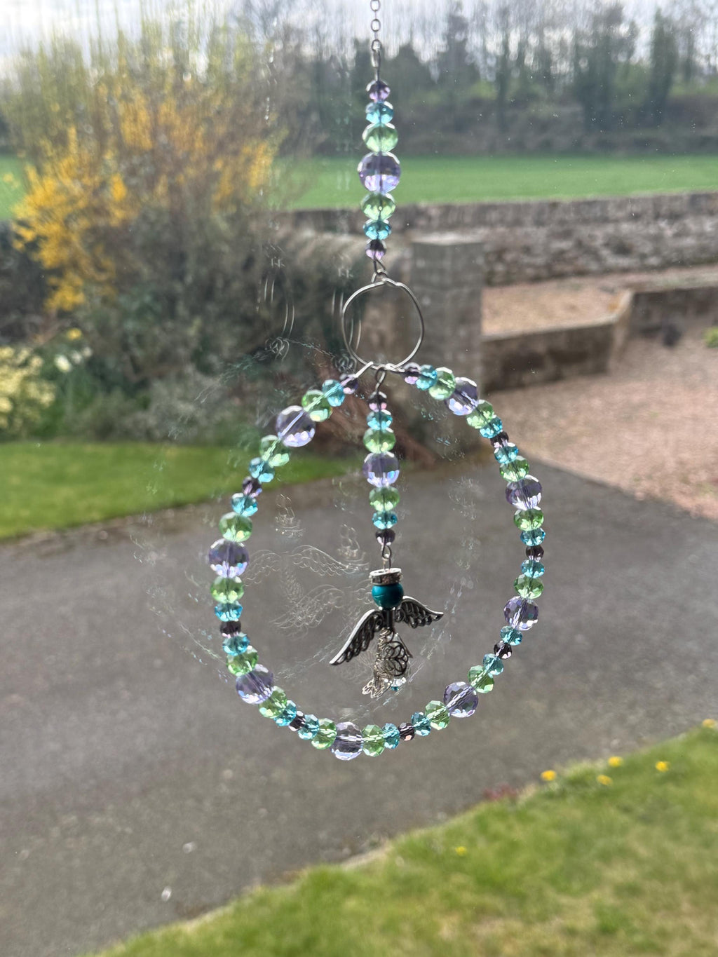 Angel Suncatcher â€“ Beaded Circle Window Hanging