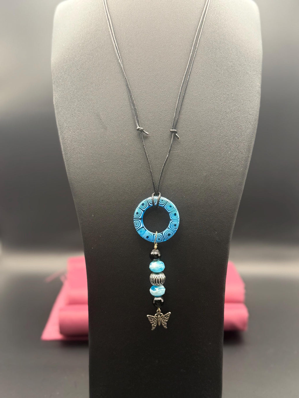 Blue Beaded Circle Pendant Necklace with Butterfly Charm