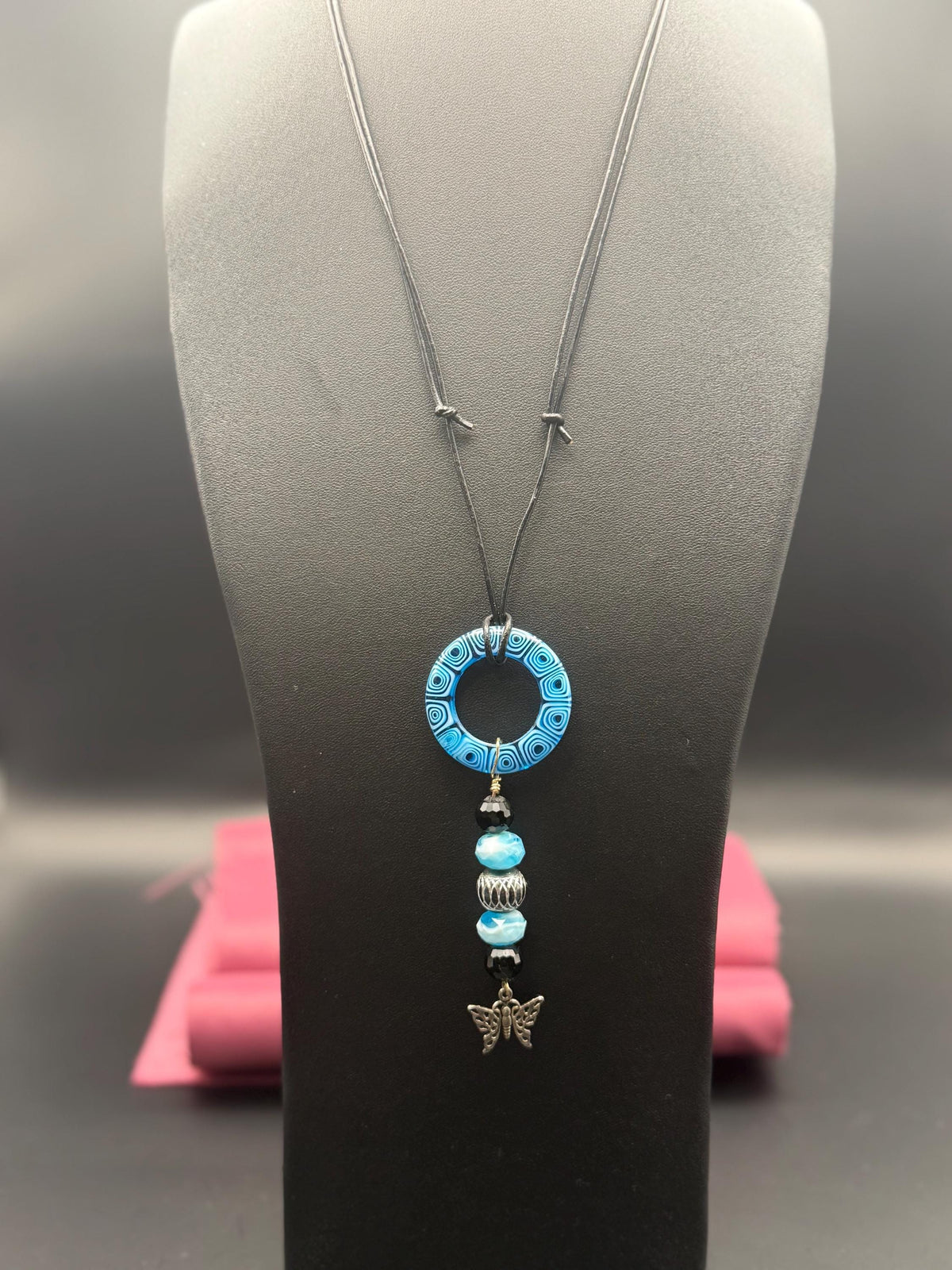 Blue Beaded Circle Pendant Necklace with Butterfly Charm