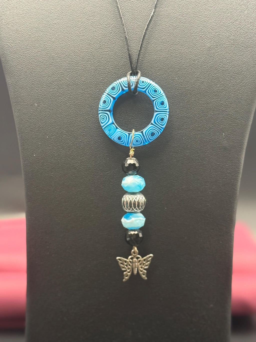 Blue Beaded Circle Pendant Necklace with Butterfly Charm