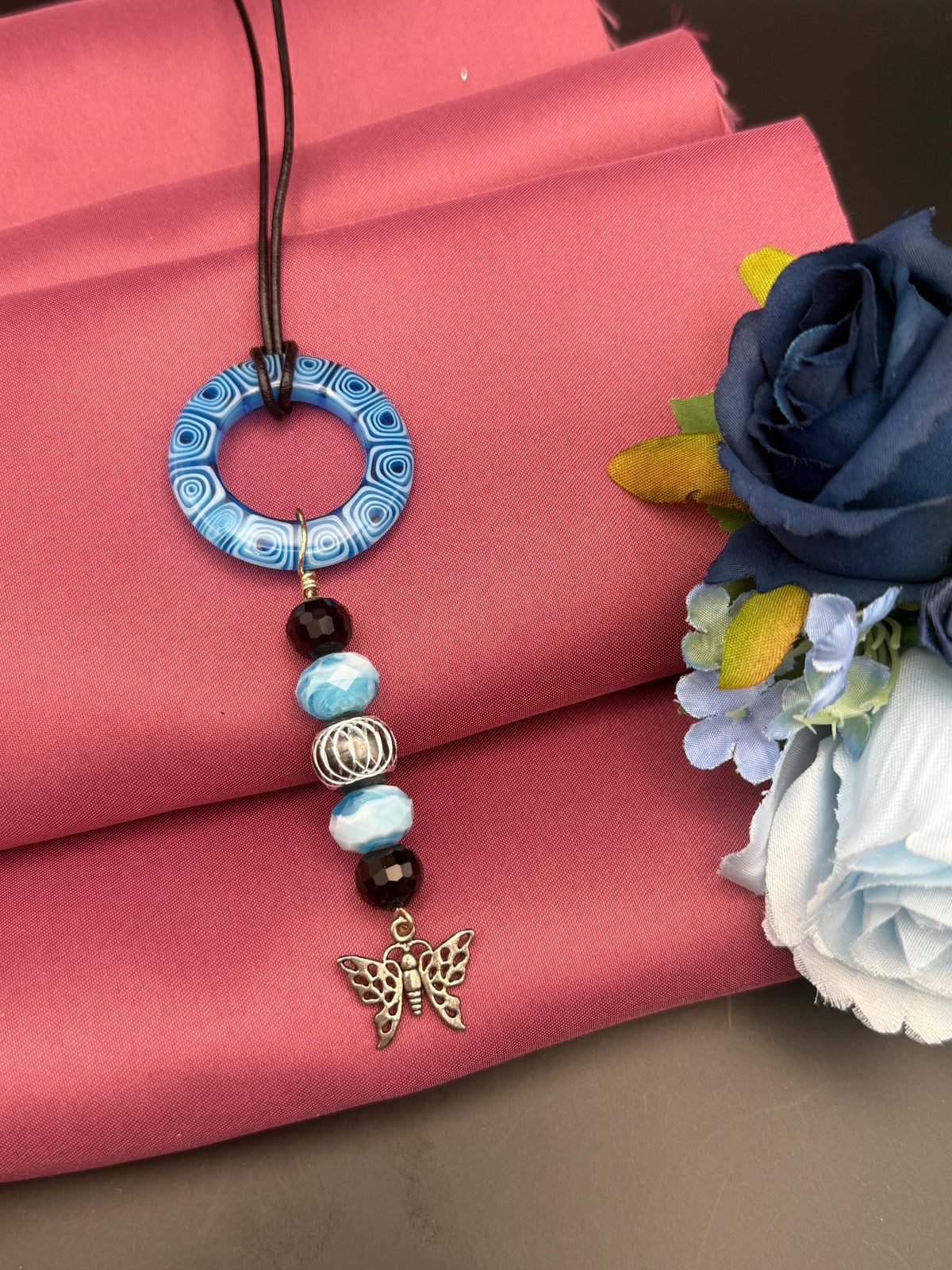 Blue Beaded Circle Pendant Necklace with Butterfly Charm